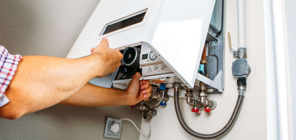Plumber,attaches,trying,to,fix,the,problem,with,the,residential